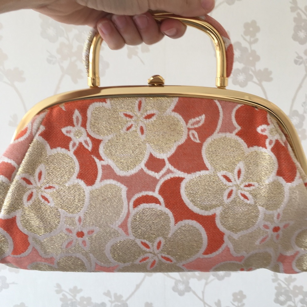 Banana Republic coral purse.
